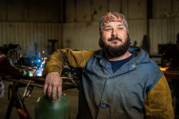 Dinklage Feedyards Maintenance Division Team in Scottsbluff Nebraska. Welding and machining ironwork careers. Photo Credit John Patrick Phelan ©️2024