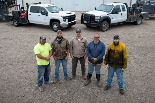 Dinklage Feedyards Maintenance Division Team in Scottsbluff Nebraska. Welding and machining ironwork careers. Photo Credit John Patrick Phelan ©️2024