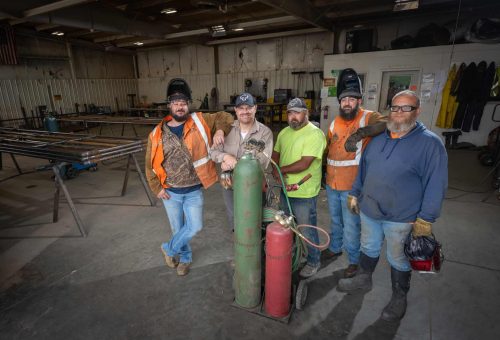 Dinklage Feedyards Maintenance Division Team in Scottsbluff Nebraska. Welding and machining ironwork careers. Photo Credit John Patrick Phelan ©️2024